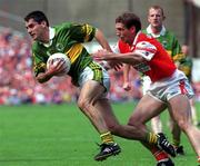 20 August 2000; Tom O'Sullivan of Kerry in action against Kieran McGeeney of Armagh during the Bank of Ireland All-Ireland Senior Football Championship Semi-Final match between Kerry and Armagh at Croke Park in Dublin. Photo by John Mahon/Sportsfile