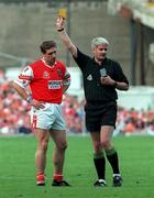20 August 2000; Kieran McGeeney of Armagh is shown a yellow card by referee John Bannon during the Bank of Ireland All-Ireland Senior Football Championship Semi-Final match between Kerry and Armagh at Croke Park in Dublin. Photo by John Mahon/Sportsfile