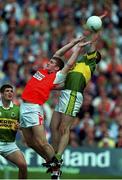 20 August 2000; Seamus Moynihan of Kerry in action against Tony McEntee of Armagh during the Bank of Ireland All-Ireland Senior Football Championship Semi-Final match between Kerry and Armagh at Croke Park in Dublin. Photo by Damien Eagers/Sportsfile