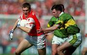 20 August 2000; Alan O'Neill of Armagh in action against Michael McCarthy of Kerry during the Bank of Ireland All-Ireland Senior Football Championship Semi-Final match between Kerry and Armagh at Croke Park in Dublin. Photo by Damien Eagers/Sportsfile