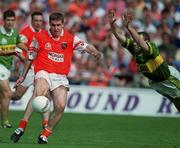 20 August 2000; Tony McEntee of Armagh in action against Seamus Moynihan of Kerry during the Bank of Ireland All-Ireland Senior Football Championship Semi-Final match between Kerry and Armagh at Croke Park in Dublin. Photo by Damien Eagers/Sportsfile