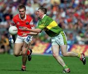 20 August 2000; Tomás Ó Sé of Kerry in action against Alan O'Neill of Armagh during the Bank of Ireland All-Ireland Senior Football Championship Semi-Final match between Kerry and Armagh at Croke Park in Dublin. Photo by Damien Eagers/Sportsfile