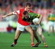 20 August 2000; Tomás Ó Sé of Kerry in action against Paddy McKeever of Armagh during the Bank of Ireland All-Ireland Senior Football Championship Semi-Final match between Kerry and Armagh at Croke Park in Dublin. Photo by Damien Eagers/Sportsfile