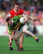 20 August 2000; Tomás Ó Sé of Kerry in action against Paddy McKeever of Armagh during the Bank of Ireland All-Ireland Senior Football Championship Semi-Final match between Kerry and Armagh at Croke Park in Dublin. Photo by Damien Eagers/Sportsfile