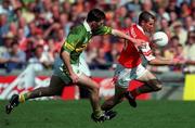 20 August 2000; Steven McDonnell of Armagh in action against Michael McCarthy of Kerry during the Bank of Ireland All-Ireland Senior Football Championship Semi-Final match between Kerry and Armagh at Croke Park in Dublin. Photo by Damien Eagers/Sportsfile