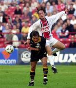 24 August 2000; Simon Webb of Bohemians in action against Cato Guntveit of Aberdeen during the UEFA Cup Qualifying Round Second Leg match between Bohemians and Aberdeen at Tolka Park in Dublin. Photo by David Maher/Sportsfile