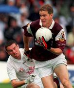 27 August 2000; Michael Donnellan of Galway in action against Padraig Brennan of Kildare during the Bank of Ireland All-Ireland Senior Football Championship Semi-Final match between Galway and Kildare at Croke Park in Dublin. Photo by Matt Browne/Sportsfile