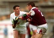 27 August 2000; Dermot Earley of Kildare is tackled by Tomás Meehan of Galway during the Bank of Ireland All-Ireland Senior Football Championship Semi-Final match between Galway and Kildare at Croke Park in Dublin. Photo by Ray McManus/Sportsfile