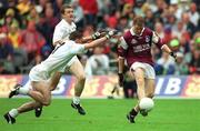 27 August 2000; Michael Donnellan of Galway in action against Anthony Rainbow of Kildare during the Bank of Ireland All-Ireland Senior Football Championship Semi-Final match between Galway and Kildare at Croke Park in Dublin. Photo by Matt Browne/Sportsfile