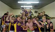 8 July 2015; Wexford players celebrates with cup in the dressing room after the game. Bord Gáis Energy Leinster GAA Hurling U21 Championship Final, Wexford v Kilkenny. Innovate Wexford Park, Wexford. Picture credit: Piaras Ó Mídheach / SPORTSFILE