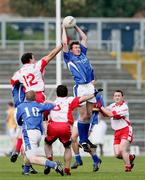 28 September 2008; Kevin McGourty, St Gall's, in action against Brendan Herron, Lamh Dhearg. Antrim County Senior Football Final, St Gall's v Lamh Dhearg, Casement Park, Belfast, Co. Antrim. Picture credit: Oliver McVeigh / SPORTSFILE