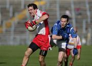 28 September 2008; Brendan Herron, Lamh Dhearg, in action against Simon Kennedy, St Gall's. Antrim County Senior Football Final, St Gall's v Lamh Dhearg, Casement Park, Belfast, Co. Antrim. Picture credit: Oliver McVeigh / SPORTSFILE