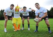 1 October 2008; Rugby star Simon Keogh and his team-mates, Trevor Hogan, left, and Felix Jones, line out with the Dublin Simon Fun Run chicken, Alan McGuire, to encourage people of all ages to register and take part in the Fun Run @ www.funrun.ie. The Dublin Simon 25th Fun Run takes place next Saturday 11th October in The Phoenix Park. The ‘Dublin Simon 2008 5 Mile Fun Run’ is the longest running charity race in the Park and will celebrate its 25th year in 2008 with an action packed family event for people of all ages looking to have fun, get fit and help raise €100,000 for emergency accommodation for those experiencing homelessness in Dublin. David Lloyd Riverview Fitness Centre, Clonskeagh, Dublin. Picture credit: Matt Browne / SPORTSFILE  *** Local Caption ***