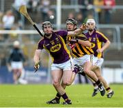 8 July 2015; Andrew Kenny, Wexford, in action against Conor Martin, Kilkenny. Bord Gáis Energy Leinster GAA Hurling U21 Championship Final, Wexford v Kilkenny, Innovate Wexford Park, Wexford. Picture credit: Matt Browne / SPORTSFILE