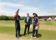 10 July 2015; Paras Khadka, left, Nepal, and Muhammad Ghous, USA, with match referee Steve Bernard during the coin toss. ICC World Twenty20 Qualifier 2015, Nepal v USA. Stormont, Belfast. Picture credit: Oliver McVeigh / ICC / SPORTSFILE