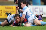 4 October 2008; Paul O'Donohoe, Clontarf, is tackled by Ciaran O'Boyle and Cillian O'Boyle, left, Garryowen. AIB League Division 1, Clontarf v Garryowen, Castle Avenue, Clontarf, Dublin. Photo by Sportsfile