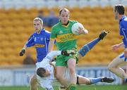 5 October 2008; Garret Hickey, Rhode, is tackled by Tullamore goalkeeper Ken Furlong which resulted in a saved penalty. Offaly County Senior Football Final, Rhode v Tullamore, O'Connor Park, Tullamore, Co. Offaly. Picture credit: Pat Murphy / SPORTSFILE