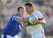 5 October 2008; Derek Daly, Kiltegan, in action against Ronan Connolly, St. Patrick's. Wicklow Senior Football Final, St. Patrick's v Kiltegan, County Grounds, Aughrim, Co. Wicklow. Photo by Sportsfile