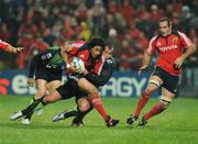 10 October 2008; Lifeimi Mafi, Munster, is tackled by Bogdan Balan, Montauban. Heineken Cup, Pool 1, Round 1, Munster v Montauban, Thomond Park, Limerick. Picture credit: Matt Browne / SPORTSFILE