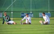 12 October 2008; Republic of Ireland players left to right, Kevin Doyle, Liam Miller and Daryl Murphy do some stretches during squad training. Gannon Park, Malahide, Co. Dublin. Picture credit: David Maher / SPORTSFILE