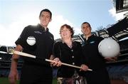 8 October 2008; Kilkenny hurler Derek Lyng and Westmeath footballer Dessie Dolan, right, look on as Elizabeth Reynolds, General Manager, Consumer Healthcare, GlaxoSmithKiline, representing Lucozade Sport, shows off her hurling skills at the launch of the 2008 GAA Games Development Conference sponsored by Lucozade Sport. Croke Park, Dublin. Picture credit: Pat Murphy / SPORTSFILE