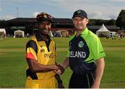 15 July 2015; Ireland captain William Porterfield, right, and PNG captain Jack Vare shake hands before the match. ICC World Twenty20 Qualifier 2015, Ireland v PNG, Stormont, Belfast, Co. Antrim. Picture credit: Seb Daly / ICC / SPORTSFILE