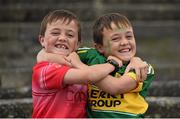 18 July 2015; Twins Jack, supporting Cork, left, and Conor O'Keeffe, supporting Kerry, age 9, from Firies, Co. Kerry, ahead of the game. Munster GAA Football Senior Championship Final Replay, Kerry v Cork. Fitzgerald Stadium, Killarney, Co. Kerry. Picture credit: Stephen McCarthy / SPORTSFILE