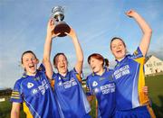 2 November 2008; Mountmellick Sarsfields players Alison McEvoy, Emma McEvoy, Fiona Whelan, and Jenny McEvoy, celebrate with the cup after the match. VHI Healthcare Leinster Senior Club Ladies Football Final, Clonee, Wexford v Mountmellick Sarsfields, Laois, Fr Mahar Park, Graiguecullen, Carlow. Picture credit: Brian Lawless / SPORTSFILE