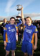 2 November 2008; Mountmellick Sarsfields co-captains Ciara O'Loughlin, left, and Emma McEvoy, lift the cup after the match. VHI Healthcare Leinster Senior Club Ladies Football Final, Clonee, Wexford v Mountmellick Sarsfields, Laois, Fr Mahar Park, Graiguecullen, Carlow. Picture credit: Brian Lawless / SPORTSFILE