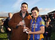 2 November 2008; John McGrath, VHI, presents Aileen O'Loughlin, Mountmellick Sarsfields, with the Player of the Match award. VHI Healthcare Leinster Senior Club Ladies Football Final, Clonee, Wexford v Mountmellick Sarsfields, Laois, Fr Mahar Park, Graiguecullen, Carlow. Picture credit: Brian Lawless / SPORTSFILE