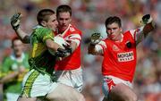 2 September 2000; Darragh O'Se of Kerry in action against Andrew McCann and Kieran Hughes of Armagh during the Bank of Ireland All-Ireland Senior Football Championship Semi-Final Replay match between Kerry and Armagh at Croke Park in Dublin. Photo by Brendan Moran/Sportsfile