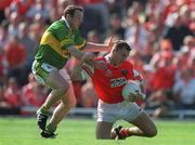 2 September 2000; Paddy McKeever of Armagh in action against Seamus Moynihan of Kerry during the Bank of Ireland All-Ireland Senior Football Championship Semi-Final Replay match between Kerry and Armagh at Croke Park in Dublin. Photo by Brendan Moran/Sportsfile