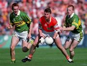 2 September 2000; Kieran Hughes, of Armagh in action against Noel Kennelly, left, and Liam Hassett of Kerry during the Bank of Ireland All-Ireland Senior Football Championship Semi-Final Replay match between Kerry and Armagh at Croke Park in Dublin. Photo by Brendan Moran/Sportsfile