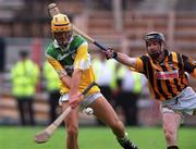 10 September 2000; Ger Oakley of Offaly in action against DJ Carey of Kilkenny during the pre match parade ahead of the All-Ireland Senior Hurling Championship Final match between Kilkenny and Offaly at Croke Park in Dublin. Photo by Ray McManus/Sportsfile