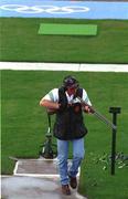 16 September 2000; Ireland's Derek Burnett blows away some gunpowder residue after a shot during the Men's Trap Qualification. Cecil Park Shooting Centre, Sydney West, Australia. Photo by Brendan Moran/Sportsfile