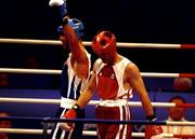 18 September 2000; Ireland's Michael Roche (right) looks dejected as Turkey's Firat Karagollu celebrates his victory in the Men's 71kg First Round. Sydney Exhibition Hall 3, Darling Harbour, Sydney, Australia. Photo by Brendan Moran/Sportsfile