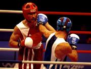 18 September 2000; Ireland's Michael Roche (left) is hit with a punch by Turkey's Firat Karagollu during their bout in the Men's 71kg First Round. Sydney Exhibition Hall 3, Darling Harbour, Sydney, Australia. Photo by Brendan Moran/Sportsfile