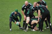 3 November 2008; Scrum-half Eoin Reddan takes the ball away from a ruck watched by team-mates John Hayes, Paul O'Connell and Shane Horgan during Ireland Rugby Squad Training. Donnybrook Stadium, Donnybrook, Dublin. Picture credit: Brendan Moran / SPORTSFILE