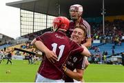 26 July 2015; Galway's Tom Monaghan, 11, Fintan Burke and Jack Fitzpatrick, behind, celebrate after the match. Electric Ireland GAA Hurling All-Ireland Minor Championship, Quarter-Final, Limerick v Galway. Semple Stadium, Thurles, Co. Tipperary. Picture credit: Piaras Ó Mídheach / SPORTSFILE