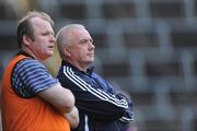 16 November 2008; Sarsfields manager Berti Og Murphy,  watches the game with selector Teddy McCarthy. AIB Munster Senior Club Hurling Championship Semi-Final, Sarsfields v De La Salle, Pairc Ui Chaoimh, Cork. Picture credit: Matt Browne / SPORTSFILE