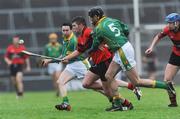 16 November 2008; Michael Noonan, Adare, in action against Padraig Hackett, right, and Michael Bevans, Toomevara. AIB Munster Senior Club Hurling Championship Semi-Final, Adare v Toomevara, Gaelic Grounds, Limerick. Picture credit: Brian Lawless / SPORTSFILE