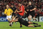 18 November 2008; James Coughlan, Munster, in action against Stephen Donald, New Zealand. Zurich Challenge Match, Munster v New Zealand, Thomond Park, Limerick. Picture credit: Brian Lawless / SPORTSFILE