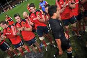 18 November 2008; The Munster players applaud the New Zealand players as they leave the pitch after the match. Zurich Challenge Match, Munster v New Zealand, Thomond Park, Limerick. Picture credit: Brian Lawless / SPORTSFILE