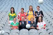 18 November 2008; Declan Moran, Director of Marketing and Business Development, Vhi Healthcare, with Geraldine Giles, Uachtaran Peil Gael na mBan, with players, clockwise from left, Michelle McGing, captain Carnacon, Co. Mayo, Fiona O'Neill, captain Kilmihil, Co. Clare, Lisa Ni Shuibhne, Ballingeary Inchigeela, Co. Cork, Aine Clarke, captain Knockmore, Co. Mayo, Sinead Mohan, captain Emyvale, Co. Monaghan, and Anne Marie Walsh, captain Inch Rovers, Co. Cork, ahead of the 2008 Vhi Healthcare All-Ireland Club Finals. The senior, intermediate and junior finals will take place over the coming two weekends. Croke Park, Dublin. Photo by Sportsfile