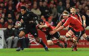 18 November 2008; Isaia Toeava, New Zealand, in action against James Coughlan and Mick O'Driscoll, right, Munster. Zurich Challenge Match, Munster v New Zealand, Thomond Park, Limerick. Picture credit: Brian Lawless / SPORTSFILE