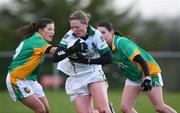 23 November 2008; Grainne Nulty, Meath, in action against Aoife Hegarty and Sarah Faulkner, Donegal. TG4 Senior Championship Relegation Play-Off, Donegal v Meath, Templeport, Co. Cavan. Picture credit: Oliver McVeigh / SPORTSFILE