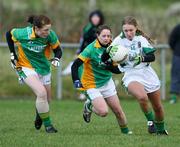 23 November 2008; Elaine Duffy, Meath, in action against Lorraine O'Sullivan and Sarah Faulkner, Donegal. TG4 Senior Championship Relegation Play-Off, Donegal v Meath, Templeport, Co. Cavan. Picture credit: Oliver McVeigh / SPORTSFILE