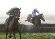 29 November 2008; Judge Roy Bean, who finished second, with Andrew McNamara up, leads the eventual winner On The Way Out, right, with Thomas Doyle up, after the last during the Kildownet Group Maiden Hurdle. Fairyhouse Winter Festival 2008. Fairyhouse Racecourse, Co. Meath. Photo by Sportsfile