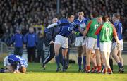30 November 2008; David Moran, Kerins O'Rahilly's, tussles with Mid Kerry players as Declan Quill lies injured. Kerry Senior Football Championship Final Replay, Kerins O'Rahilly's v Mid Kerry, Fitzgerald Stadium, Killarney, Co. Kerry. Picture credit: Stephen McCarthy / SPORTSFILE