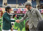 6 August 2015; Bertram Allen, Ireland, left, and Emanuele Guadiano, Italy, after finishing second and first respectively in the Serpentine Speed Stakes sponsored by CityJet during the Discover Ireland Dublin Horse Show 2015. RDS, Ballsbridge, Dublin. Picture credit: Cody Glenn / SPORTSFILE
